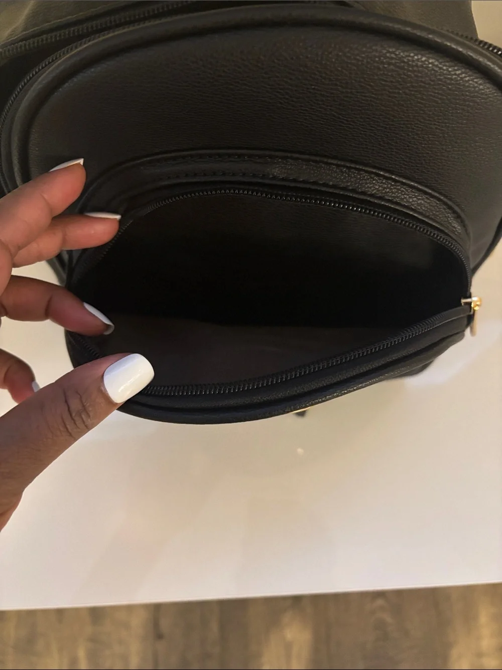 Black Women's Mini Backpack with Gold Accent